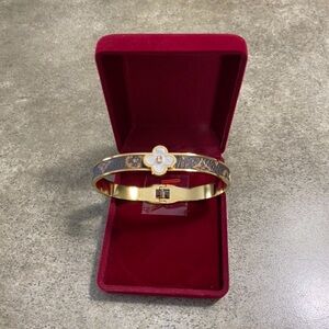 18K gold plated four leaf clover white Pearl bangle. New with box.